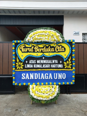 Papan Bunga Duka di Waesama